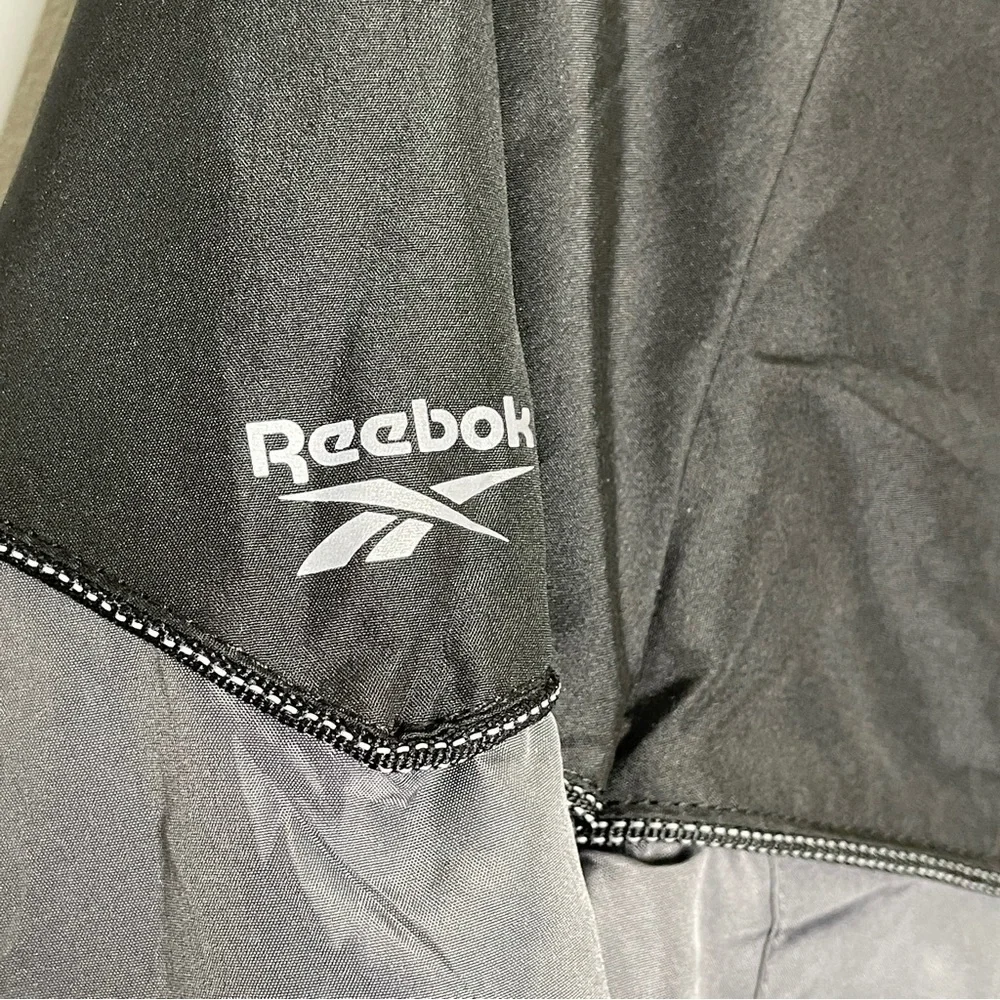 Reebok black and gray lightweight windbreaker NWT small